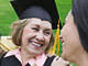 Graduate mother receiving praise