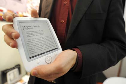 Man Holding an Electronic Reader