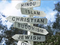 Signpost with religious choices 	