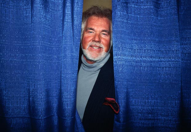 Musician Kenny Rogers looks out from backstage during events celebrating the inauguration of President Bill Clinton - Kenny Rogers Retrospective