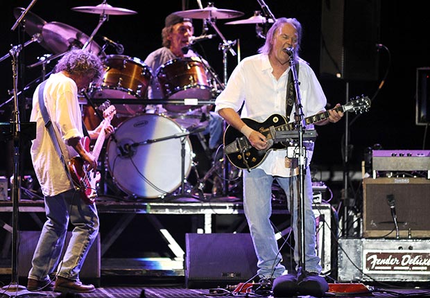 Neil Young and Crazy Horse perform in support of the bands' Americana release at the Lake Tahoe Outdoor Arena at Harveys on August 9, 2012 in Stateline, Nevada