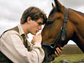 Albert (Jeremy Irvine) and his horse Joey are featured in this scene from DreamWorks Pictures' 