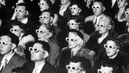 3-D Movie Viewers. Formally-attired audience sporting 3-D glasses during opening night screening of film 