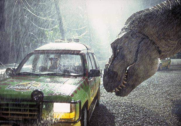 A Tyrannosaurus Rex menaces the theme park's first customers in a scene from the film 'Jurassic Park', 1993.  For the monsters we love slideshow.
