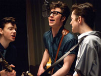 Aaron Johnson as John Lennon (center), in <i>Nowhere Boy</i>, 2009