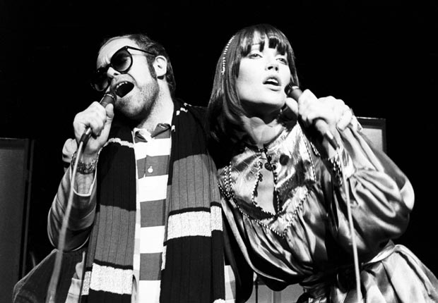 Elton John and Kiki Dee performing on stage