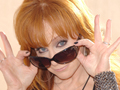 Reba in 2012, and her other notable hairstyles