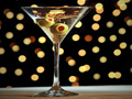 Classic martini with olives and holiday background, Holiday Cocktail Recipes