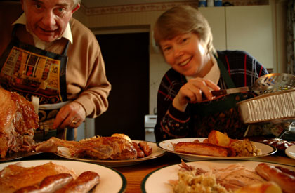 couple serving dinner couple serving dinner