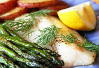 Roasting fish and vegetables provides a healthy meal quickly in one pan.
