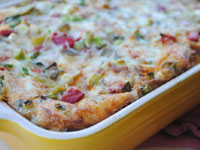 Easy strata with roasted red and green peppers