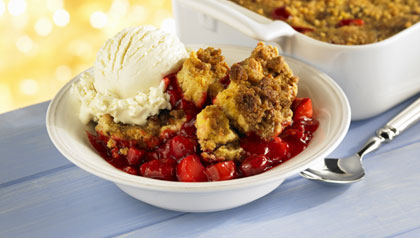 Bowl of strawberry cobbler with ice cream Bowl of strawberry cobbler with ice cream