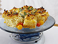 Kugel on Serving Platter for Hanukkah Dinner