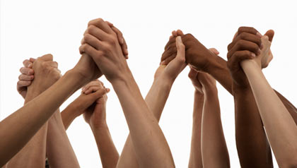 Arms raised holding hands-microgiving to charities online
