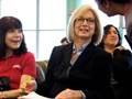 Susan Ryckman, one of AARP New York’s 5,000 volunteers, at a health care forum at Baruch College.
