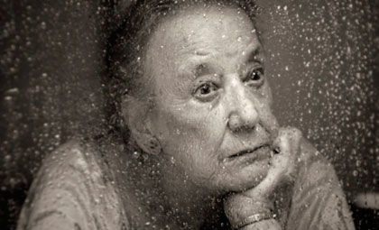 woman looking out window woman looking out window