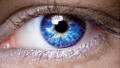 Close-up of woman's eye illustrates article on aging eyesight