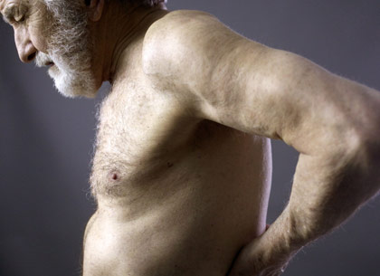 man experiencing back pain man experiencing back pain