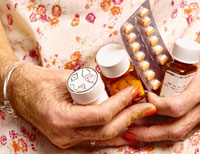 70 year old woman cleans out expired medication