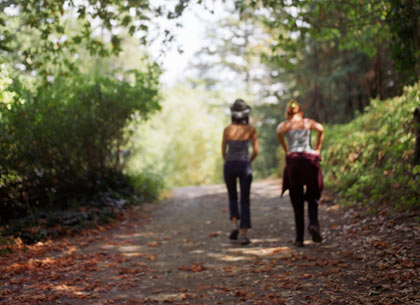 two women walking for exercise two women walking for exercise
