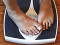 feet cover weight shown on a scale