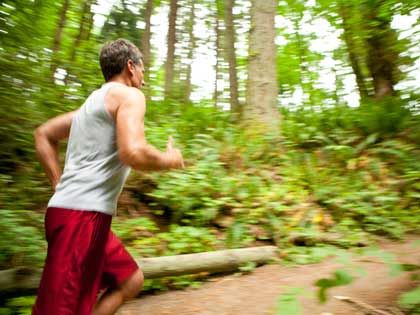 man running in the forest