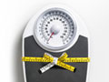 Scale tied with tape measure