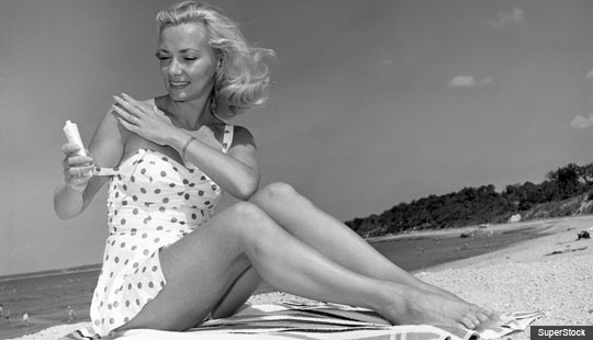 Young Woman; Beach; Sunblock; Suntan; Lotion; Summer; Sand; Face; SPF