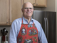 Portrait of Oren Sknner for AARP Magazine. Oren credits cooking at home with his weight loss so far