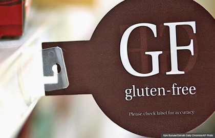 Gluten-free symbol on grocery store shelf, Martina Navratilova goes gluten-free (Kyle Bursaw/DeKalb Daily Chronicle/AP Photo)