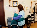 Esther Darling hugs physical therapist Yolanda Azevedo.