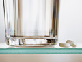 pills and water glass