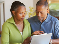 couple reviews their mortgage