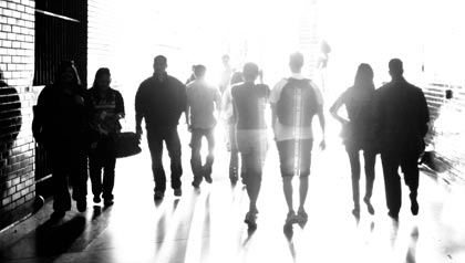 take an AARP quiz to see who has better credit- people in a train station