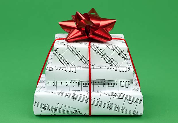 Gifts wrapped in sheet music, frugal holiday season