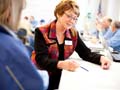 Cheryl Kelly, of Schofield, an AARP Wisconsin Fraud Fighter, gives Medicare beneficiaries tips on how to spot fraud, one of which is to carefully review all their statements.