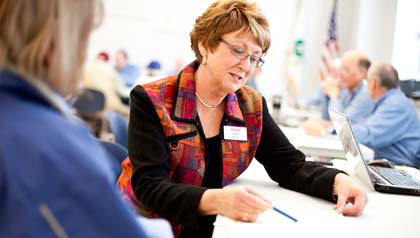 Cheryl Kelly, of Schofield, an AARP Wisconsin Fraud Fighter, gives Medicare beneficiaries tips on how to spot fraud, one of which is to carefully review all their statements. Cheryl Kelly, of Schofield, an AARP Wisconsin Fraud Fighter, gives Medicare beneficiaries tips on how to spot fraud, one of which is to carefully review all their statements.