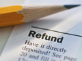 Tax form and pencil-tax tips for the unemployed