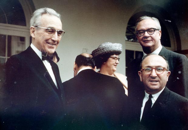 Robert Ball, Wilbur Cohen, and Arthur Altmeyer meet at the White House in 1965