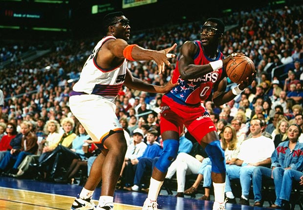 Orlando Woolridge playing basketball 