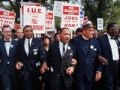 MLK jobs and freedom marching with signs