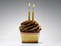 two birthday candles on a cupcake