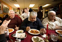 Manny Alfano, left, Charles Sousa, center, and Gene Antonio of the ROMEO club dine at La Sicilia in Belleville, N.J.