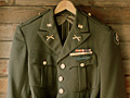 U.S. Army uniform coat in closet