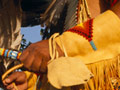 A grandfather teaches a Cherokee dance to his grandson in Stilwell, Oklahoma