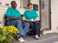 Annie Hardison (l) and Jan Kirk Wright (r) sit on Annie's porch enjoying a cup of coffee before the annual People Helping People Together work day in Columbia, TN - Volunteering