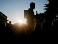 5 Things to Watch in the presidential primaries- a silhouette of a candidate speaking to a crowd