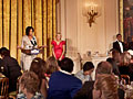 Michelle Obama and Jill Biden greet military families at White House tea