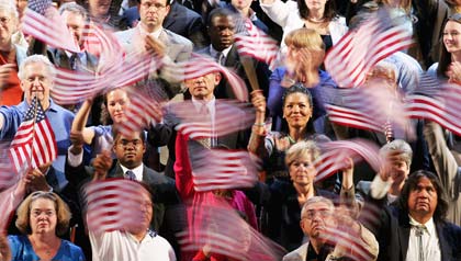 Group of people waiving American Flags, What issues matter to older voters in the 2012 Presidential Election