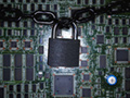 Lock chained around computer chips, online credit card application safety